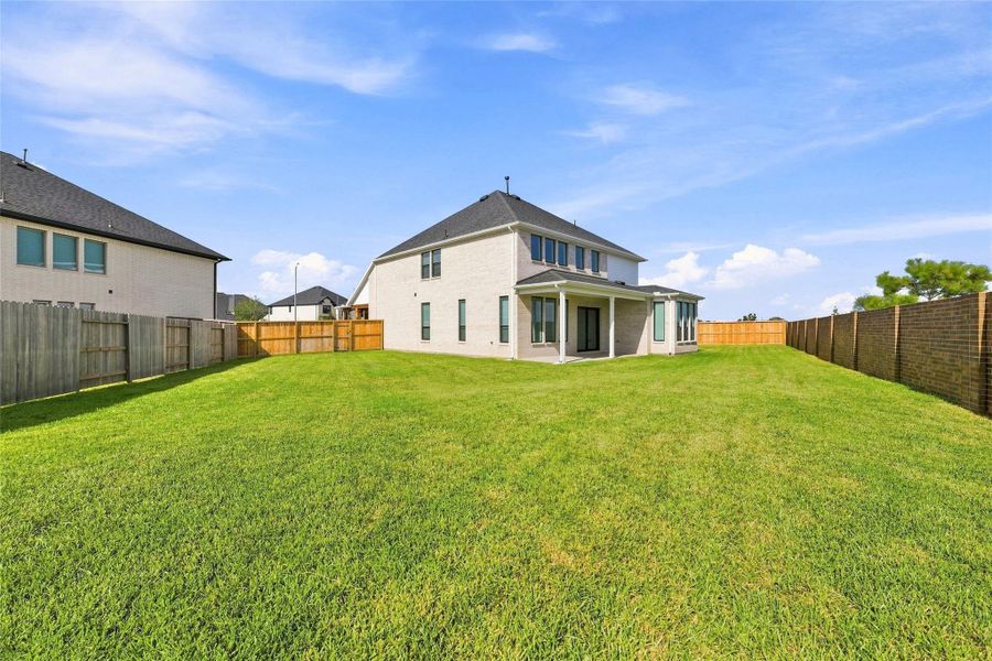 A spacious backyard with no back neighbors offers extra privacy, while the home is conveniently located next to the community pool and amenities.