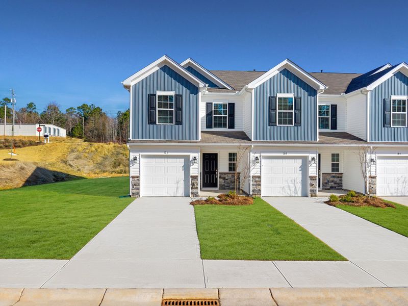 Front exterior of a new home in Springdale Towns, Clinton, SC, highlighting curb appeal (Image 1). Front exterior of a new home in Springdale Towns, Clinton, SC, highlighting curb appeal (Image 1).