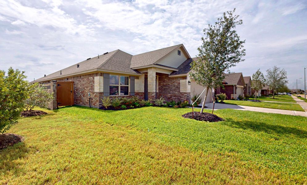 Front exterior of a new home in Cypress Green, Hockley, TX, highlighting curb appeal (Image 2). Front exterior of a new home in Cypress Green, Hockley, TX, highlighting curb appeal (Image 2).