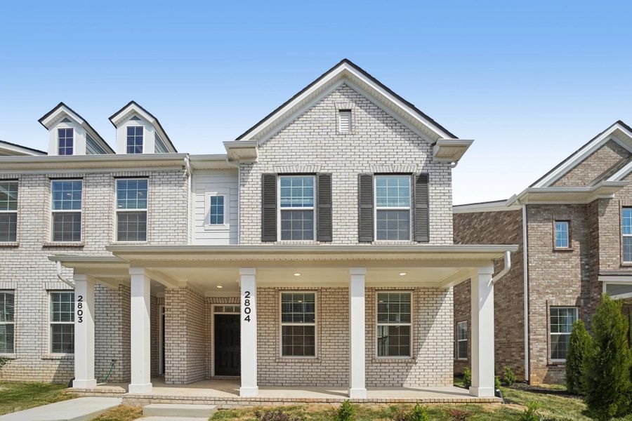 Front exterior of a new home in Promenade at Clari Park, Murfreesboro, TN, highlighting curb appeal (Image 1). Front exterior of a new home in Promenade at Clari Park, Murfreesboro, TN, highlighting curb appeal (Image 1).
