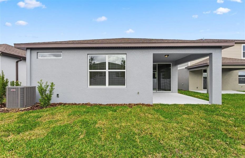 Exterior details and patio area of a home in Pioneer Ranch, Ocala (Image 3).