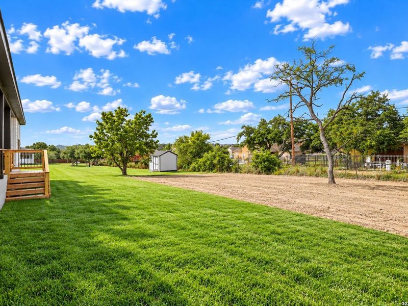 Exterior details and patio area of a home in Potranco Oaks, Castroville (Image 26).