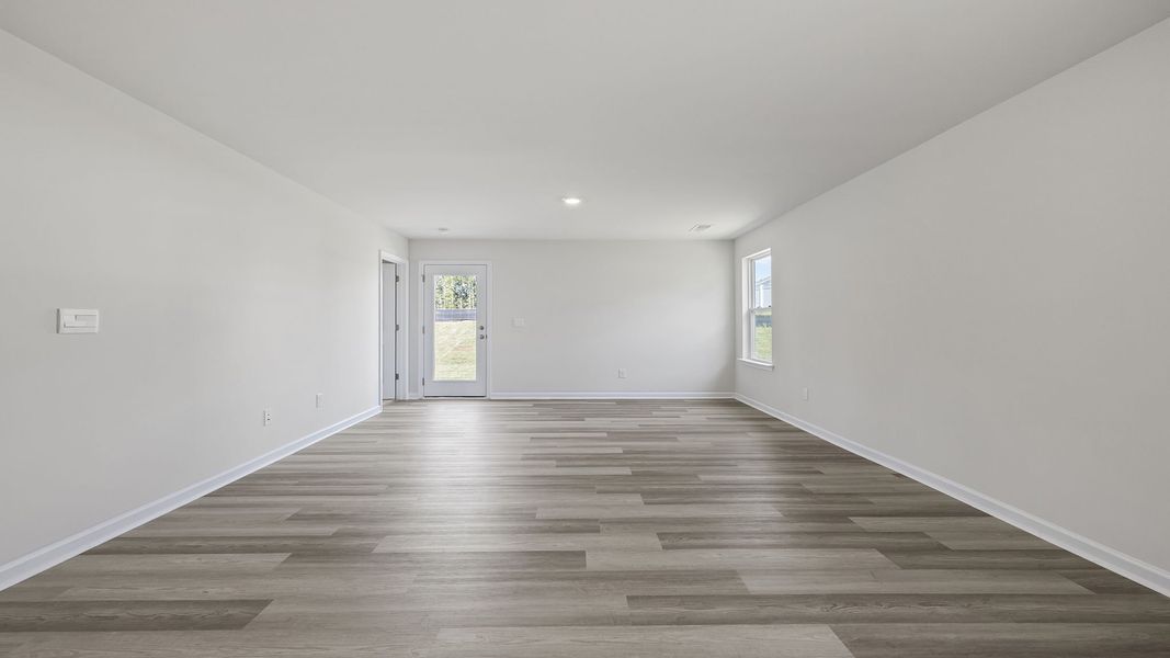 Spacious, unfurnished interior of a new home in Village Grove, Greenville (Image 24).