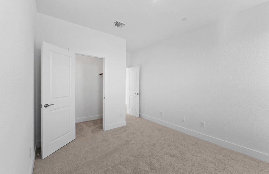 Spacious, unfurnished interior of a new home in Northpoint at Old Settlers, Round Rock (Image 20).