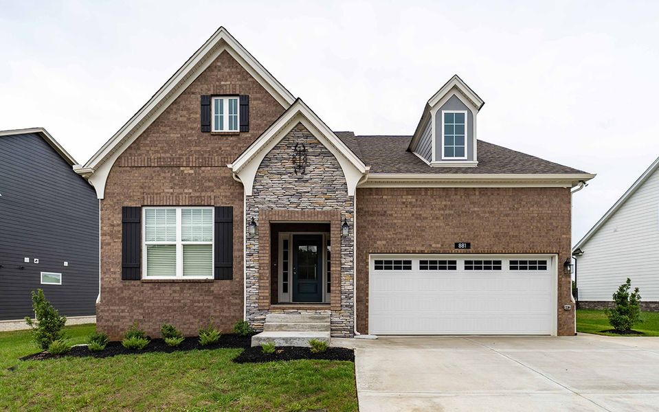 Front exterior of a new home in The Retreat at Norman Farm, Hendersonville, TN, highlighting curb appeal (Image 1). Front exterior of a new home in The Retreat at Norman Farm, Hendersonville, TN, highlighting curb appeal (Image 1).