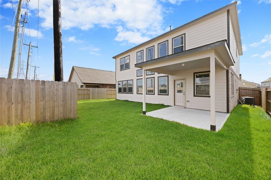 Exterior details and patio area of a home in Kendall Lakes, Alvin (Image 4). Exterior details and patio area of a home in Kendall Lakes, Alvin (Image 4).