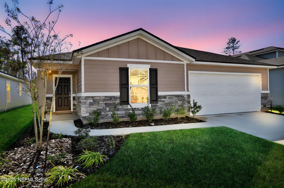 Front exterior of a new home in Wilford Oaks, Orange Park, FL, highlighting curb appeal (Image 25).