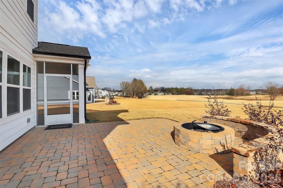 Exterior details and patio area of a home in Stonebridge Fairways, Monroe (Image 23).