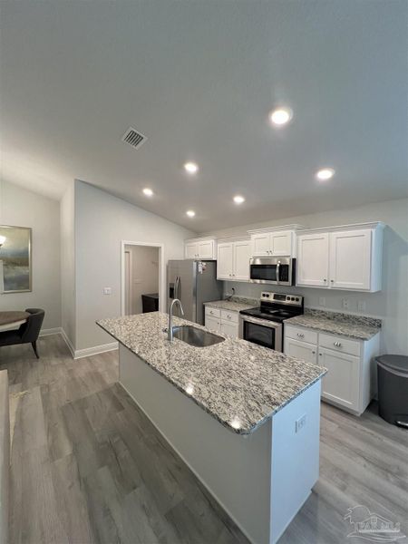 Furnished interior view inside a new home in Allison Acres, Cantonment (Image 8).