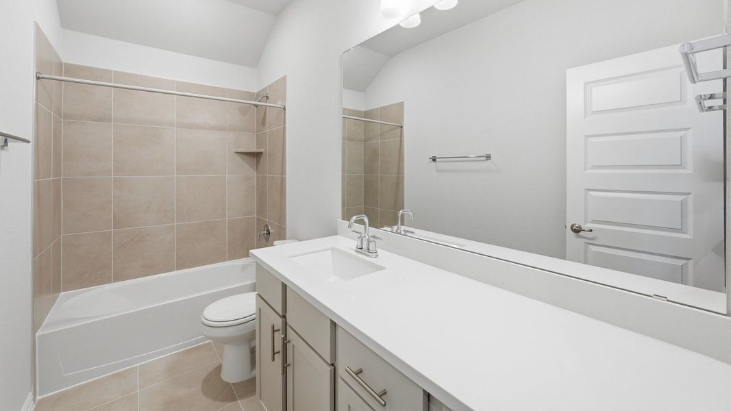 Furnished interior view inside a new home in Oaks at San Gabriel, Georgetown (Image 6).