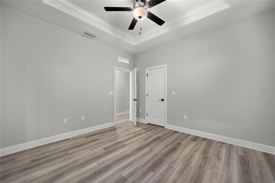 Spacious, unfurnished interior of a new home in Reunion Village, Kissimmee (Image 6).