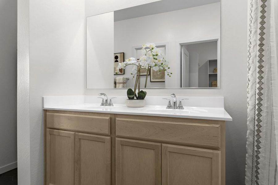 Dual-sink vanity at primary bath
