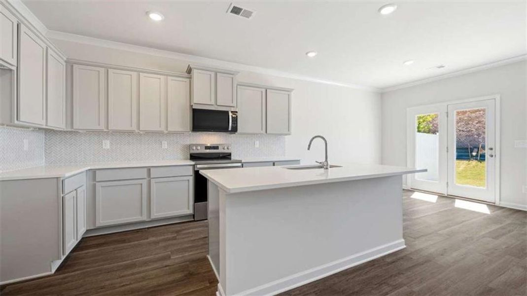 Furnished interior view inside a new home in Independence Villas and Townhomes, Loganville (Image 5).