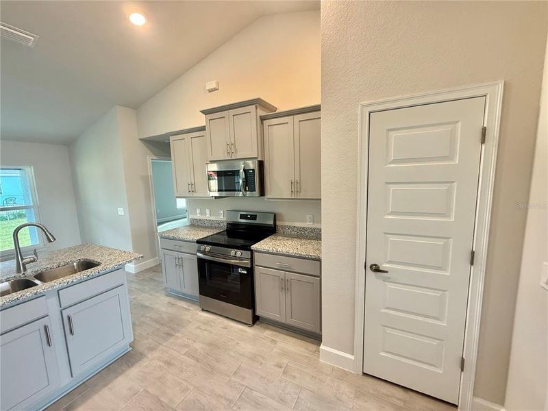 Furnished interior view inside a new home in , Port Charlotte (Image 7).