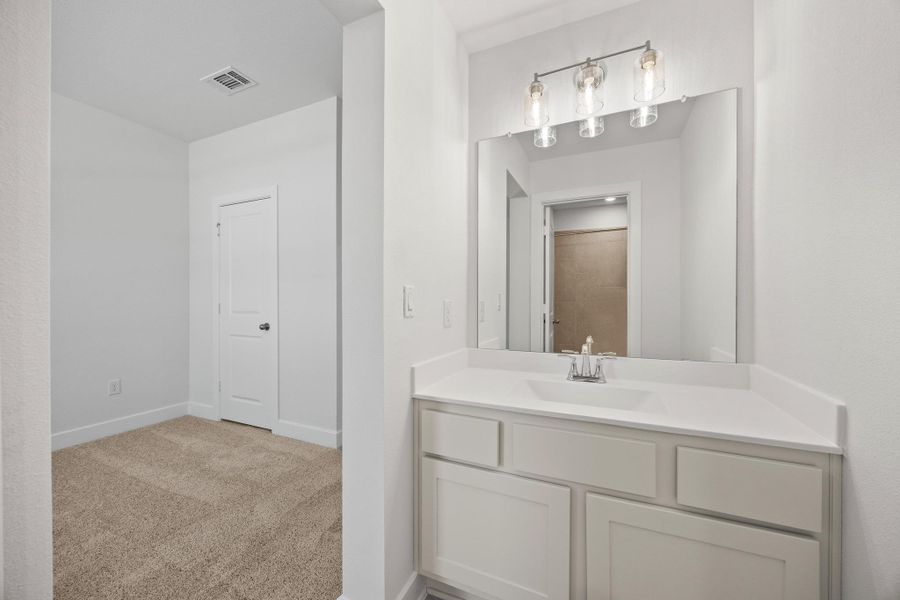 Furnished interior view inside a new home in Parmer Ranch - 60', Georgetown (Image 7).