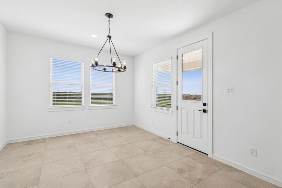 Sun-lit dining area (*Photo not of actual home and used for illustration purposes only.)
