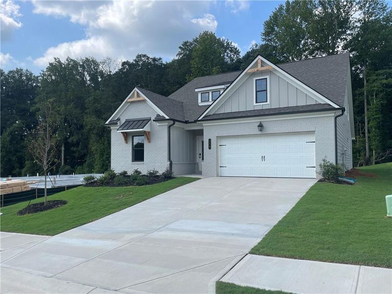Front exterior of a new home in Summerlin, Winder, GA, highlighting curb appeal (Image 25).