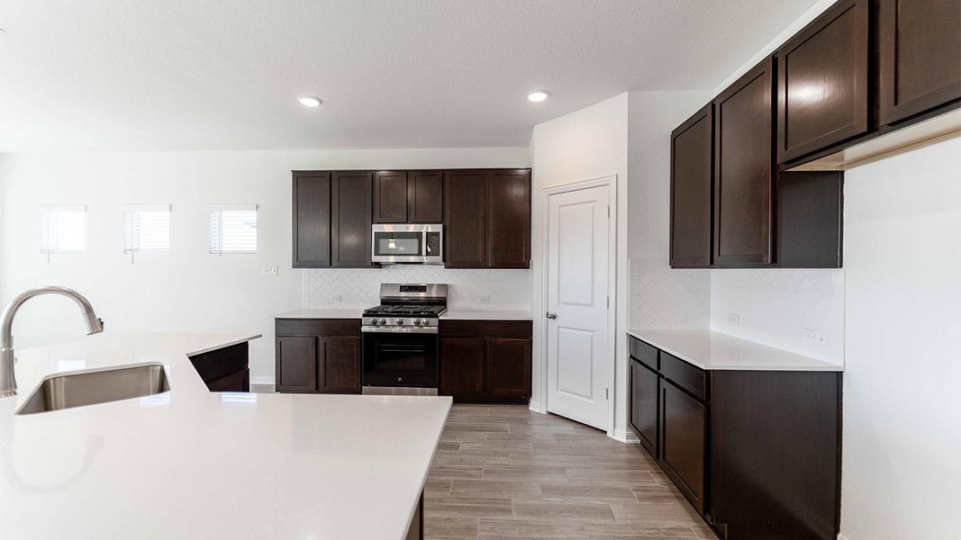 Furnished interior view inside a new home in Briarwood, Elgin (Image 8).