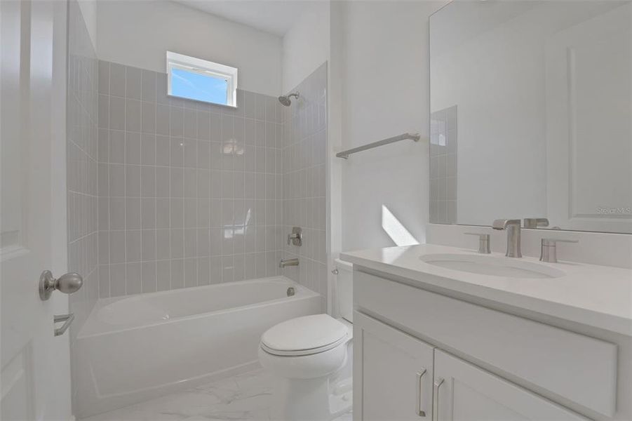 Furnished interior view inside a new home in Green Key Village, Lady Lake (Image 11).