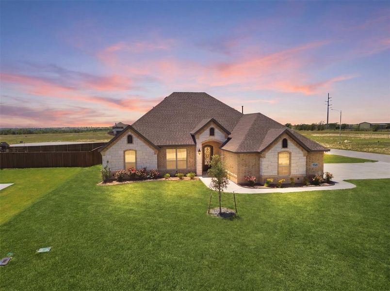 Front exterior of a new home in , Godley, TX, highlighting curb appeal (Image 26).