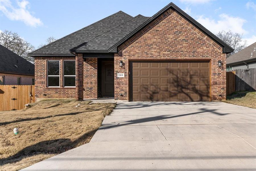 View of front property featuring a garage