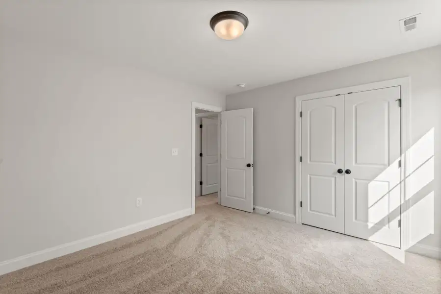 Spacious, unfurnished interior of a new home in Hayes Village, Greensboro (Image 27).