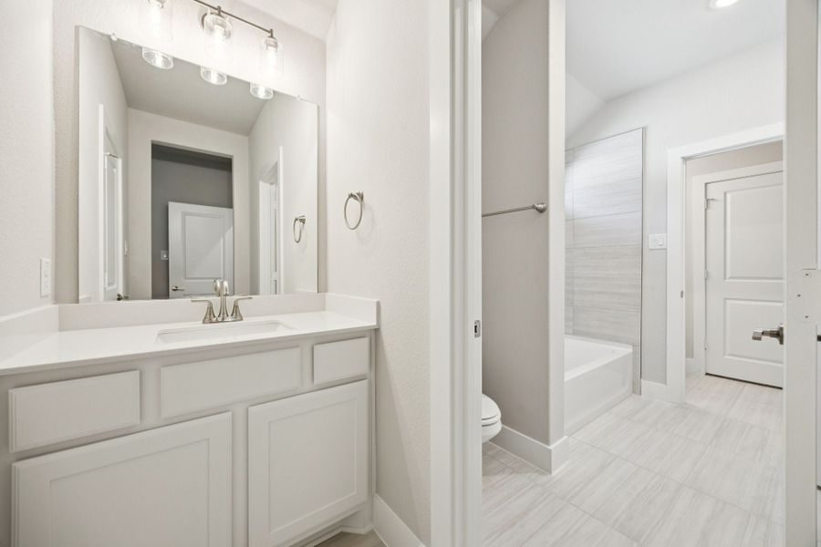 Furnished interior view inside a new home in Painted Tree Lakeside, McKinney (Image 17).
