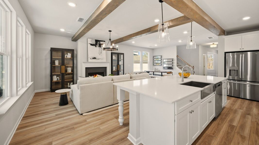 Kitchen with view of gathering room and dining area Kitchen with view of gathering room and dining area