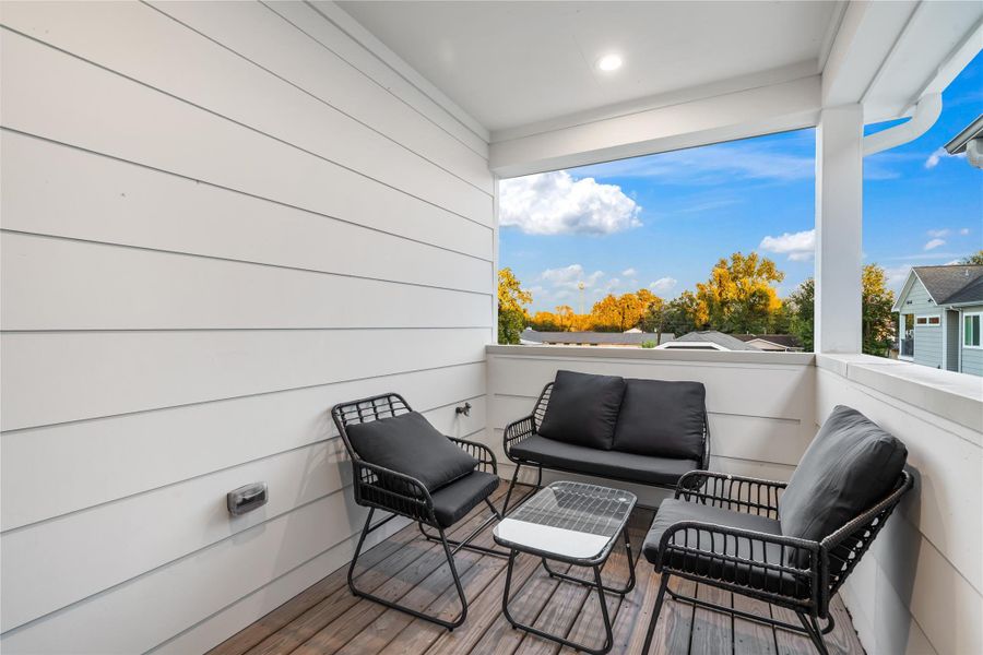 Step out onto your private covered balcony, a peaceful retreat just off the primary bedroom, perfect for enjoying your morning coffee or winding down in the evening. Step out onto your private covered balcony, a peaceful retreat just off the primary bedroom, perfect for enjoying your morning coffee or winding down in the evening.