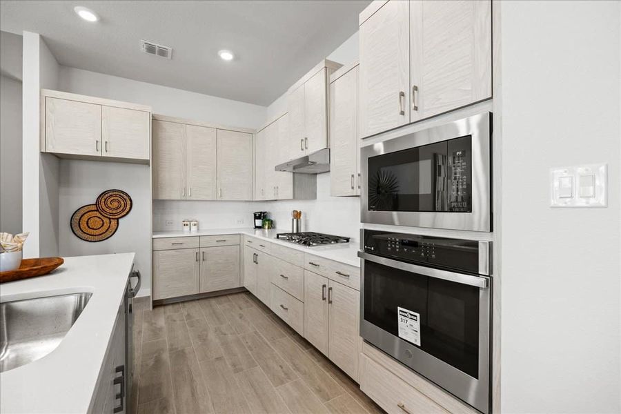 Furnished interior view inside a new home in Trace, San Marcos (Image 16).