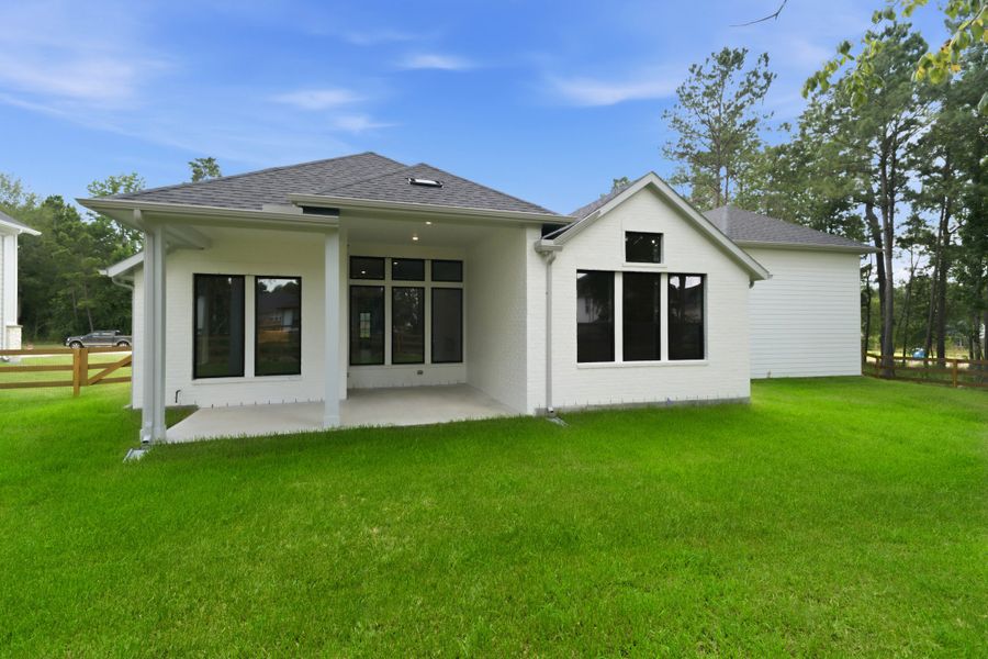 Exterior details and patio area of a home in Timber Hollow, Magnolia (Image 3). Exterior details and patio area of a home in Timber Hollow, Magnolia (Image 3).
