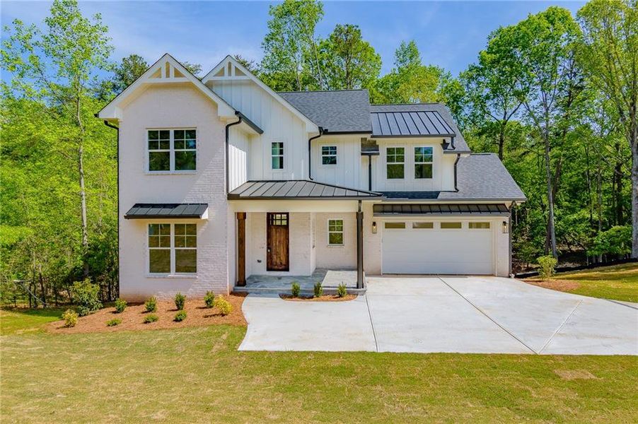Front exterior of a new home in , Gainesville, GA, highlighting curb appeal (Image 21).