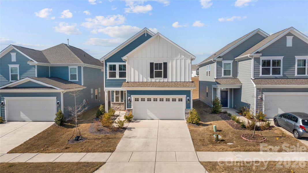 Front exterior of a new home in , Charlotte, NC, highlighting curb appeal (Image 1). Front exterior of a new home in , Charlotte, NC, highlighting curb appeal (Image 1).