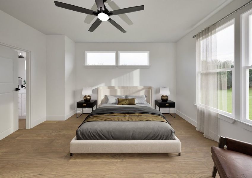 Modern bedroom with a beige bed, gray and brown bedding, and matching side tables with lamps. Large windows with sheer curtains. Bright and serene.