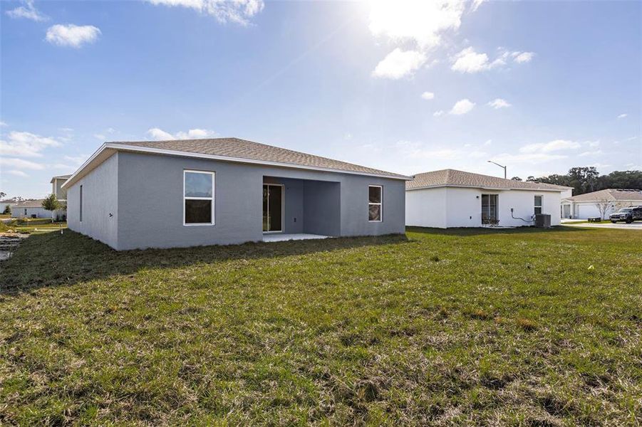 Exterior details and patio area of a home in West Oak, Ocala (Image 3).
