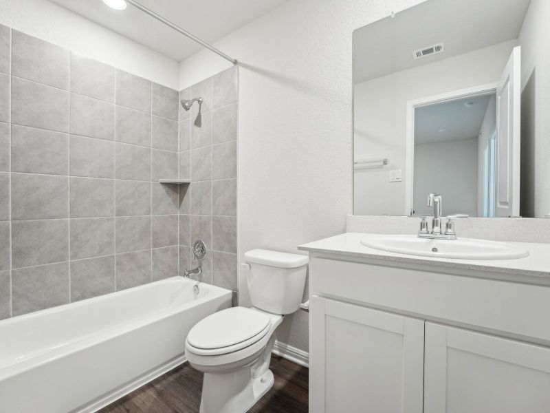 Furnished interior view inside a new home in Waterstone Village, Kyle (Image 6). Furnished interior view inside a new home in Waterstone Village, Kyle (Image 6).