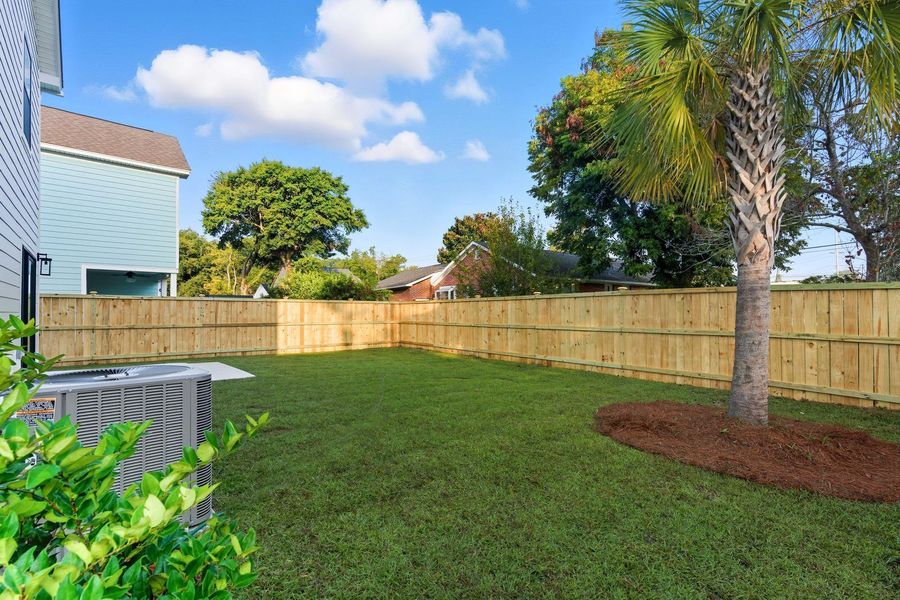 Exterior details and patio area of a home in , Charleston (Image 25). Exterior details and patio area of a home in , Charleston (Image 25).