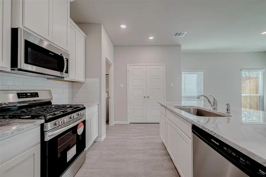 Furnished interior view inside a new home in Woodland Lakes, Houston (Image 9). Furnished interior view inside a new home in Woodland Lakes, Houston (Image 9).