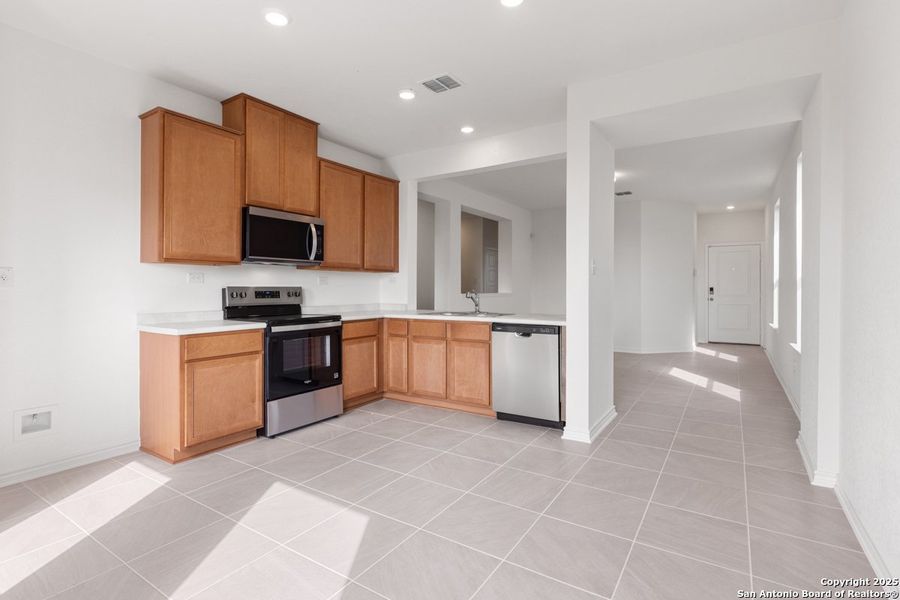 Furnished interior view inside a new home in Southton Cove, Elmendorf (Image 5). Furnished interior view inside a new home in Southton Cove, Elmendorf (Image 5).