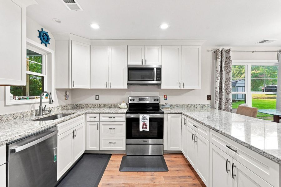 Furnished interior view inside a new home in , St. Matthews (Image 11).