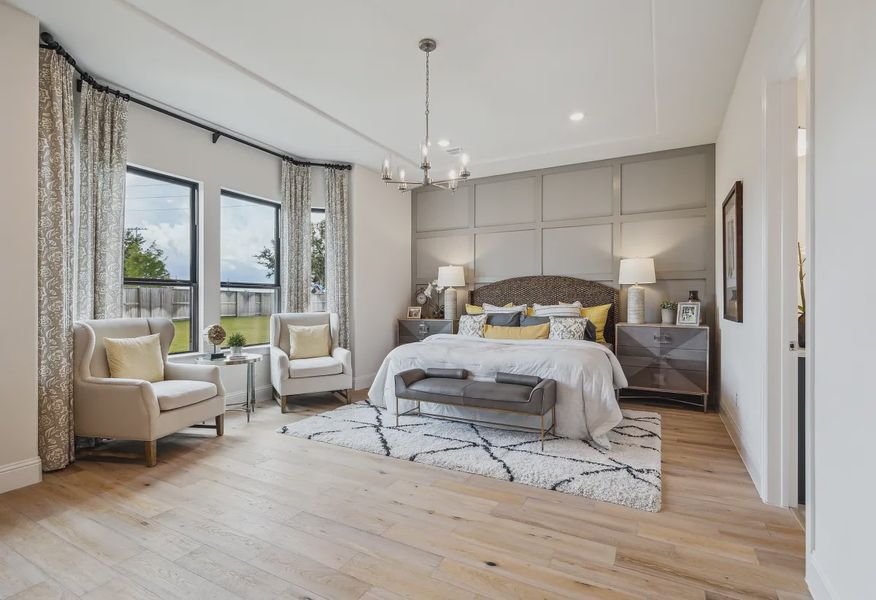 Plan 6020 primary bed - staged - 10 of 23 Plan 6020 primary bed - staged - 10 of 23