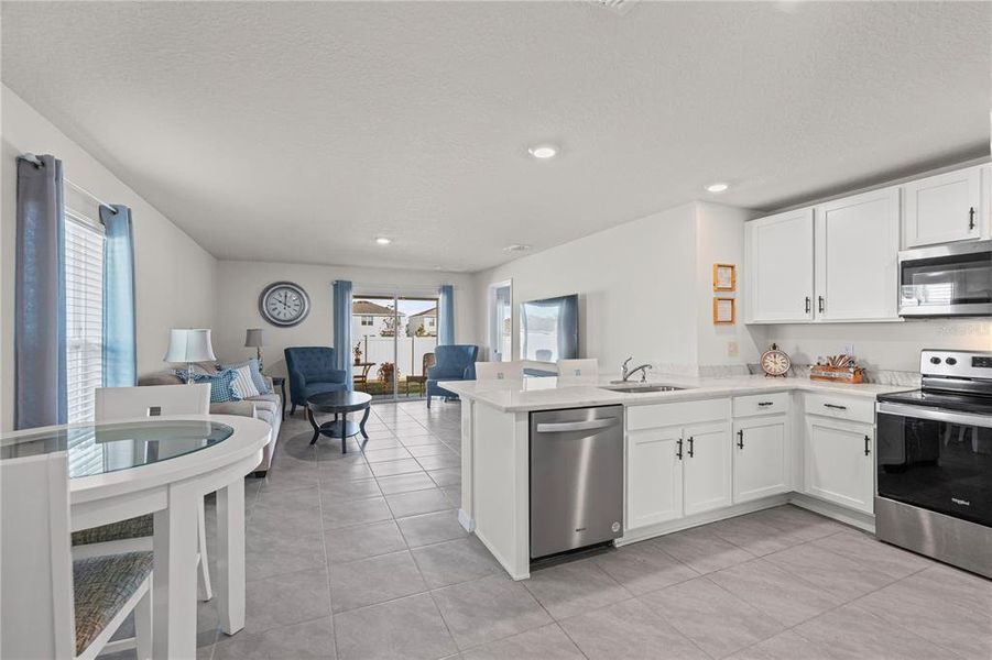 Furnished interior view inside a new home in Silverstone North, Palmetto (Image 6).