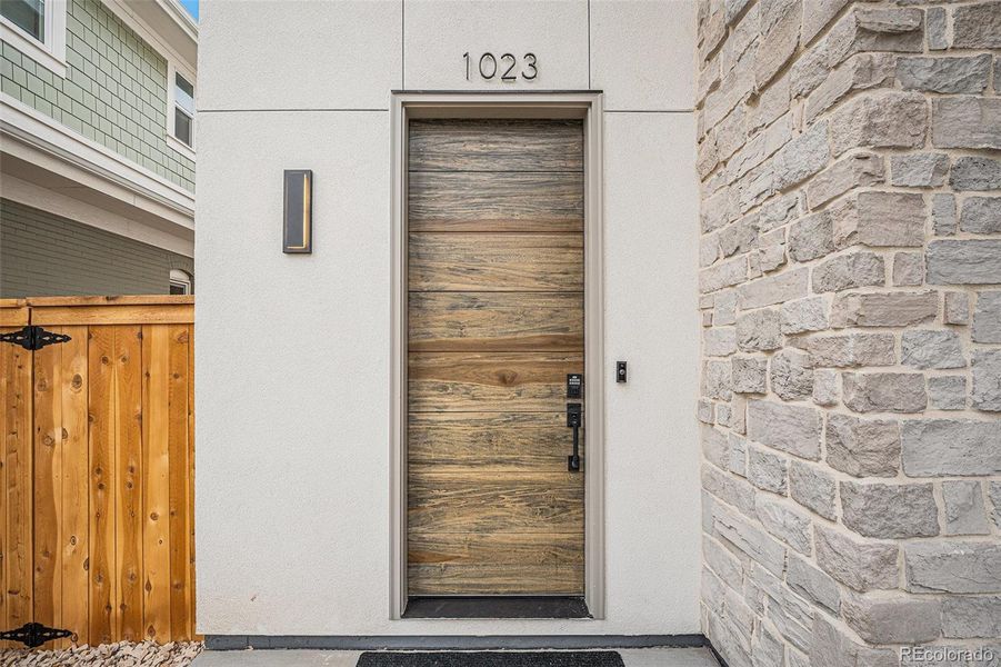 Striking custom wood front entry door
