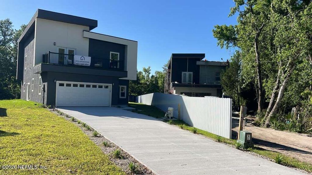 Front exterior of a new home in , Orange Park, FL, highlighting curb appeal (Image 18).