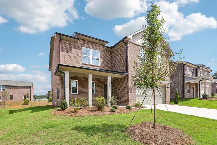 Representative exterior photo of a completed home built from the Splendor by Starlight Homes in Kendall Grove, McDonough, GA (Image 2). Representative exterior photo of a completed home built from the Splendor by Starlight Homes in Kendall Grove, McDonough, GA (Image 2).