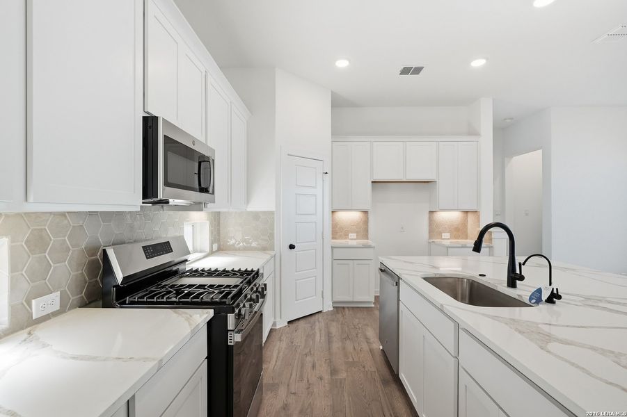 Furnished interior view inside a new home in The Crossvine, Schertz (Image 11).