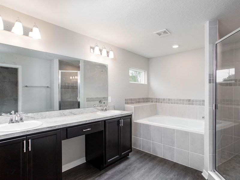 Your suite is complete with a luxurious en-suite bath - New home for sale in  Winter Haven, FL