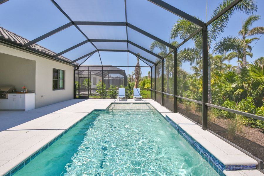 Exterior details and patio area of a home in Boca Royale Golf & Country Club at Wellen Park, Englewood (Image 23).