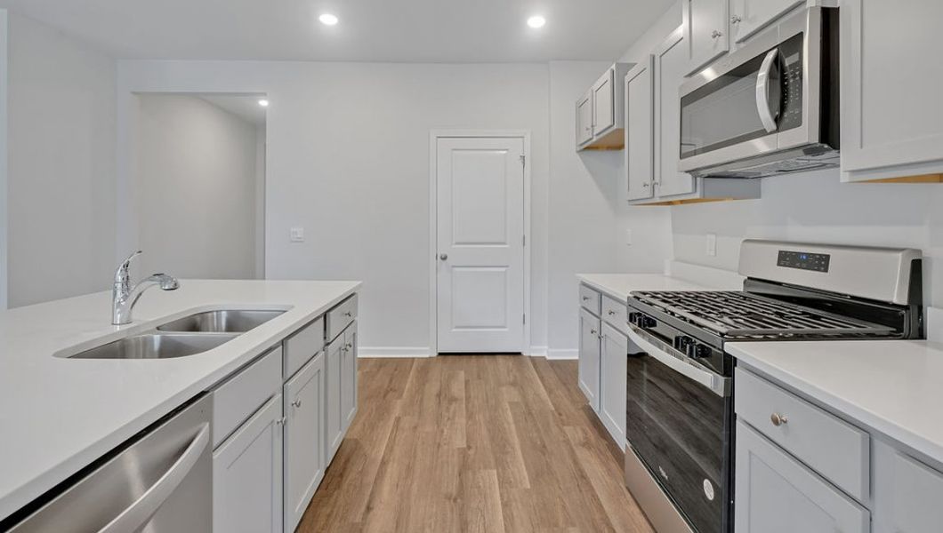 Representative furnished interior of a home built from the ARIA by D.R. Horton in Bella Point, Bolivia (Image 9).