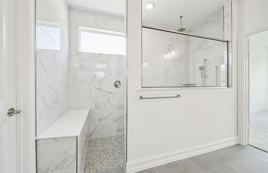 Deep walk-in shower designed for relaxation in the owner's bath *Real home pictured Deep walk-in shower designed for relaxation in the owner's bath *Real home pictured